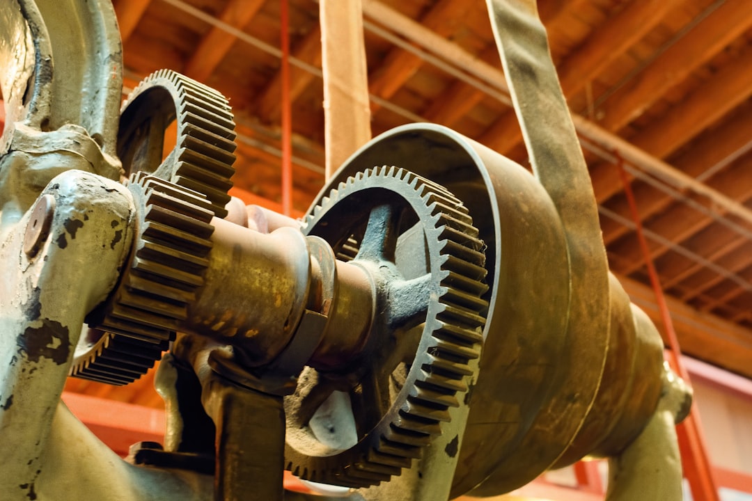 Setup Genset DSE - Close-up of old industrial gears and machinery.