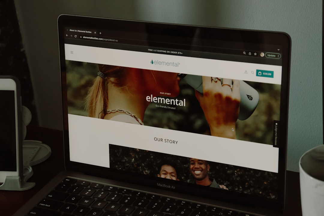 a laptop computer sitting on top of a desk
