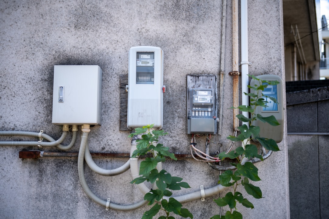 a couple of phones that are on a wall