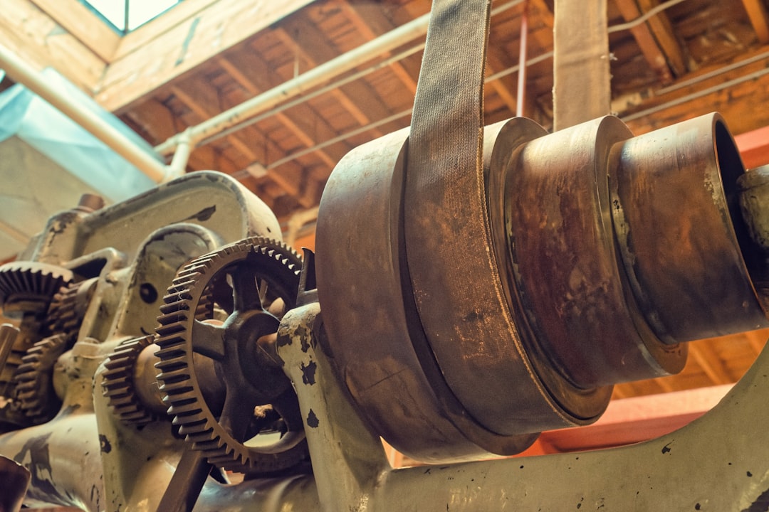Close-up of old industrial machinery with gears.